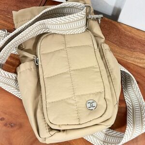 Telena Tan Nylon Crossbody Bucket Bag with Quilted Pocket and Chevron Strap